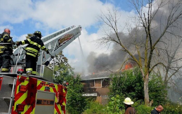 firefighters battling house fire