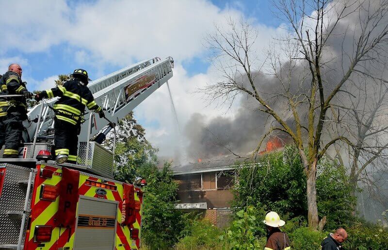 firefighters battling house fire